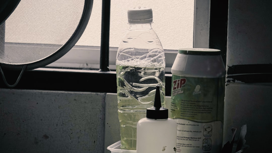 bottles-and-container-on-a-windowsill-rz7nnd5bbna